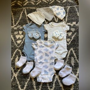 Carter’s Newborn 3 onesies, 3 hates, 2 mittens, 6 socks